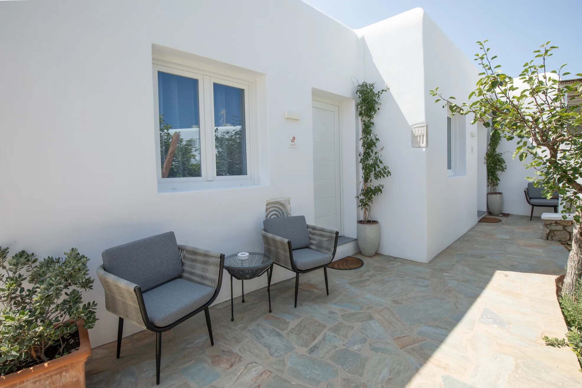 Sunny terrace seating outside the Garden Suite